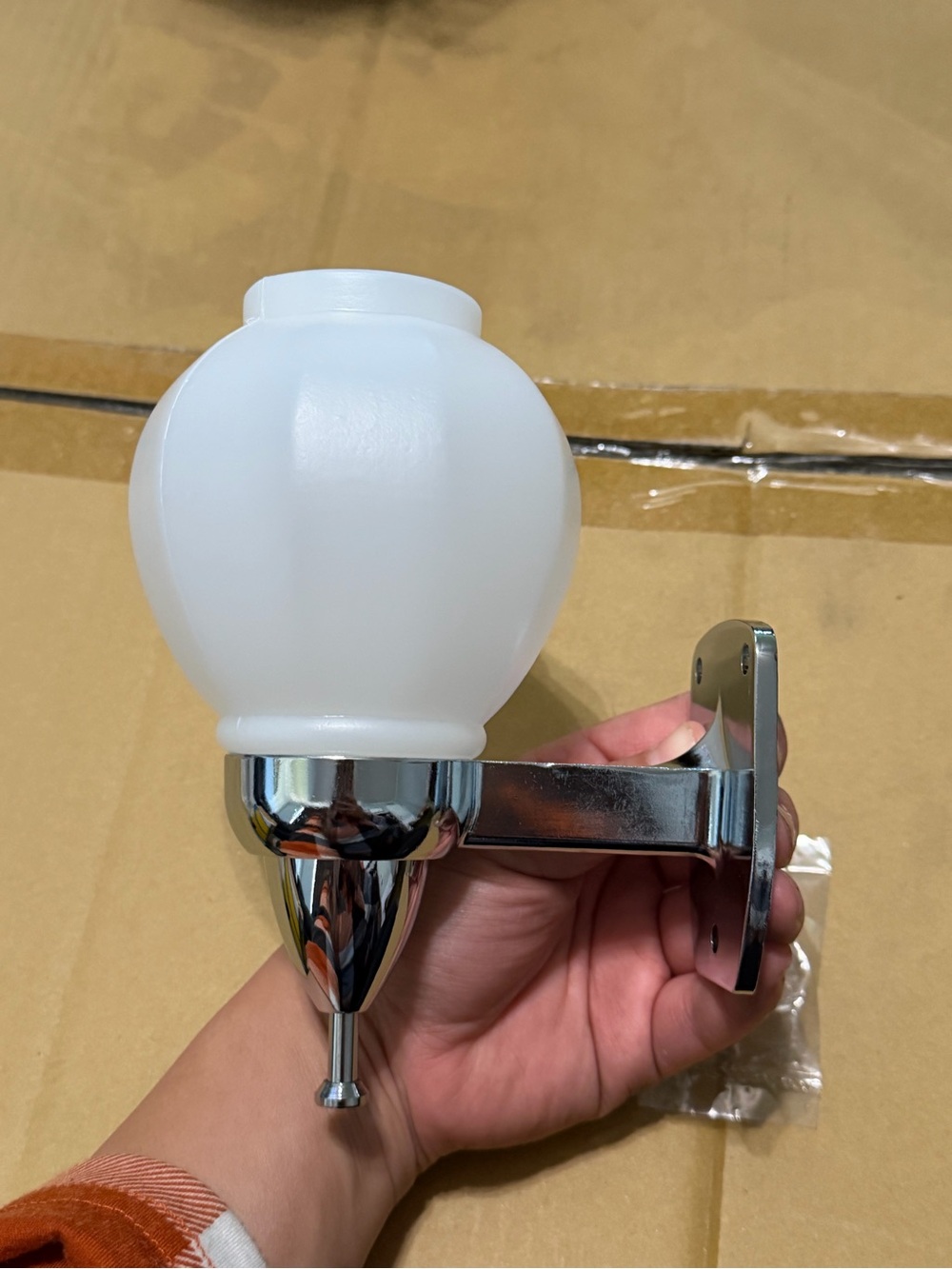 Globe shaped soap dispenser